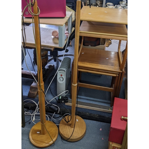 505 - Two mid 20th century teak standard lamps together with a two tier side table, a G-plan nest of three... 