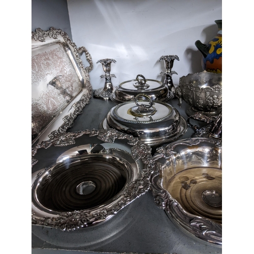 222 - Mixed silver plate to include a pair of dwarf candleholders, chamberstick with snuffer, wine coaster... 