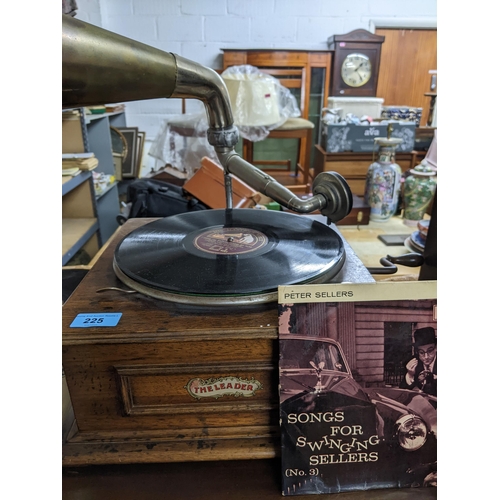 225 - The Leader wind-up gramophone with horn speaker, and a collection of various 78 rpm records Location... 