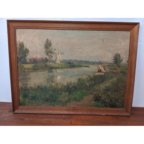 449 - A Cherry - Norfolk broads with a boat and a windmill, oil on board, 48cm x 68cm, framed
Location: G
... 