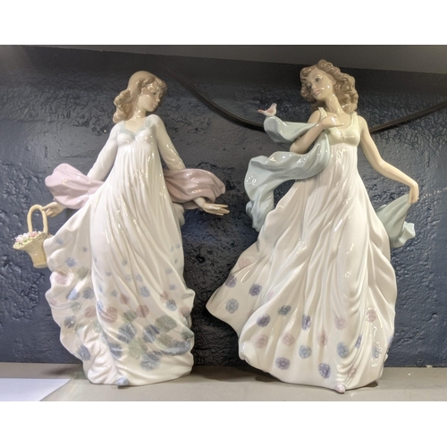 516 - Lladro figures to include Spring Splendor No 5898 and Summer Serenade No 6193, 33cm h
Location: 9:1
... 