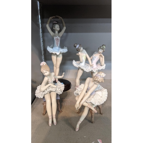 517 - Four Lladro figures of ballerinas to include No 5496, No 5498, No 5497 and other on an oval plinth
L... 