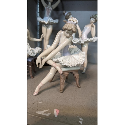 517 - Four Lladro figures of ballerinas to include No 5496, No 5498, No 5497 and other on an oval plinth
L... 