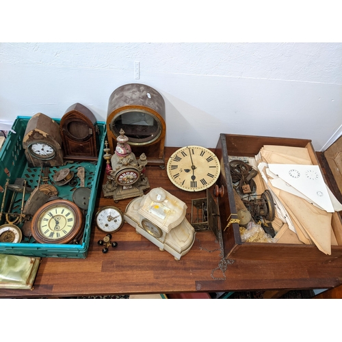 541 - The component parts of mainly mantel clocks to include inlaid mahogany cases, card dials, gongs and ... 