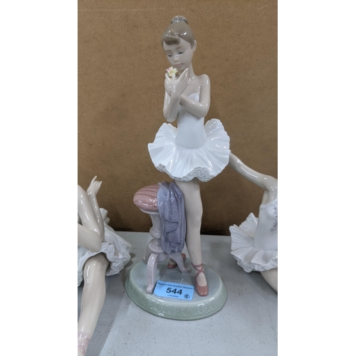 544 - Five Lladro figures of dancers to include three in various seated positions and another in a standin... 