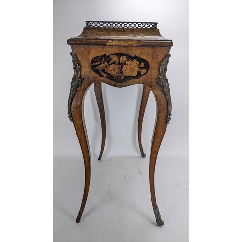 170 - A pair of 19th century French kingwood jardiniere tables, each having a pierced gallery top with a m... 