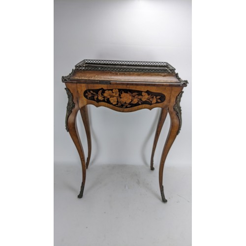 170 - A pair of 19th century French kingwood jardiniere tables, each having a pierced gallery top with a m... 