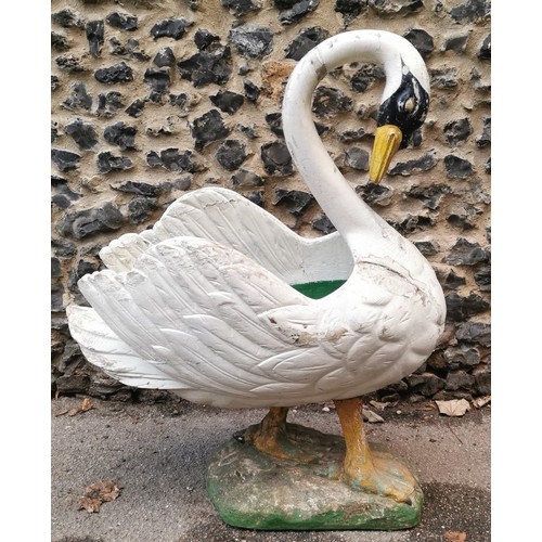 123 - A large early 20th century painted pine garden planter modelled as a swan, with carved detail to the... 