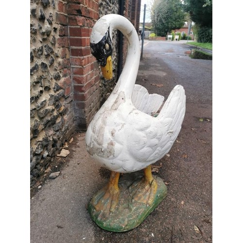 123 - A large early 20th century painted pine garden planter modelled as a swan, with carved detail to the... 