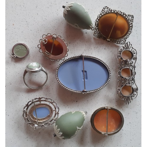 43 - A group of vintage cameo brooches and Wedgwood Jasperware jewellery. Location:Table 
If there is no ... 