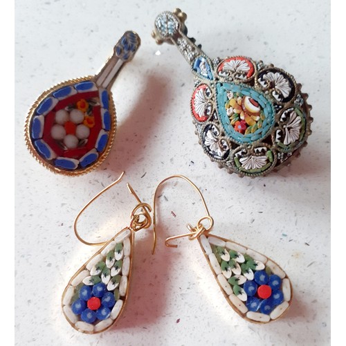 44 - Two vintage mosaic banjo brooches and a pair of micro mosaic earrings. Location:Cab 
If there is no ... 