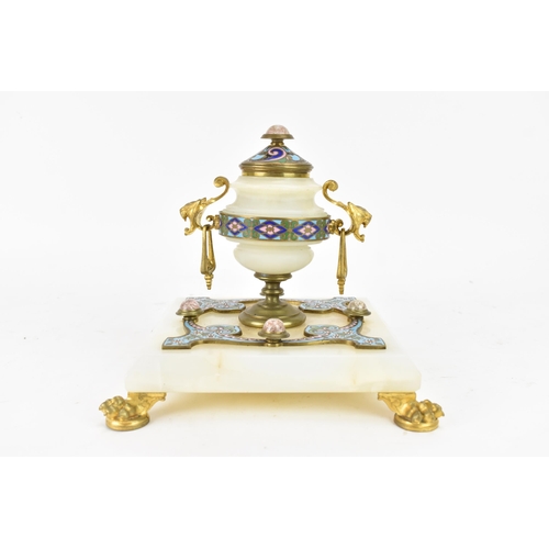 103 - A 19th century French champleve inkwell, in the form of an urn having gilt metal twin handles and li... 