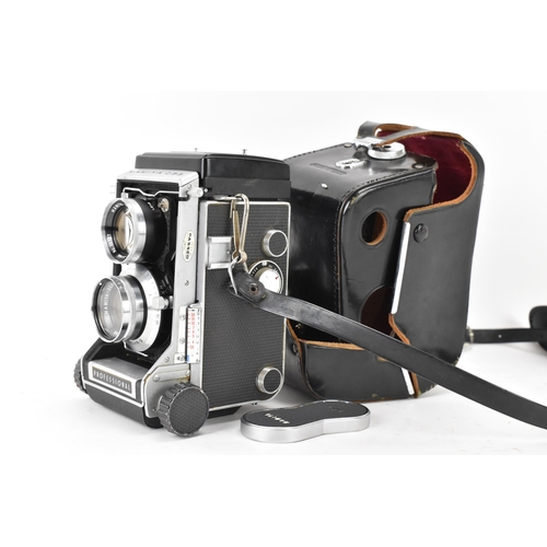 115 - A Mamiya C33 Professional TLR camera, serial no. H 337599 R, housed in a black leather case
If there... 