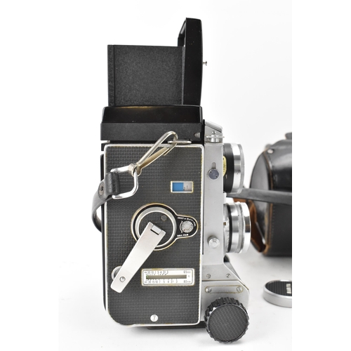 115 - A Mamiya C33 Professional TLR camera, serial no. H 337599 R, housed in a black leather case
If there... 