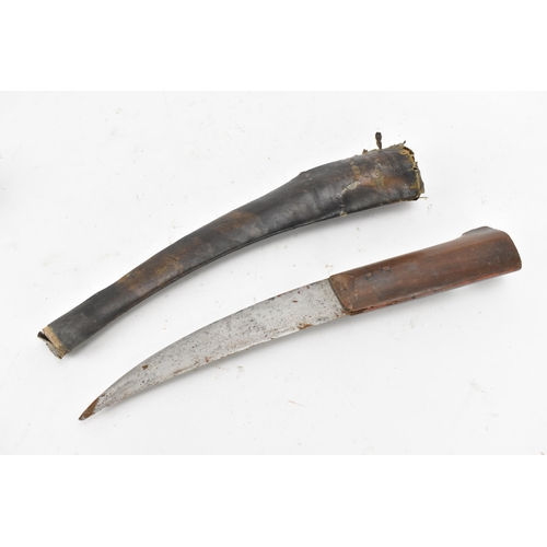 116 - Mixed weapons to include an African dagger having a sheath decorated with cowrie shells, total lengt... 