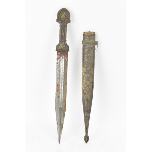 118 - A 19th century Russian Kindjal dagger, the white metal engraved scabbard decorated with a floral scr... 