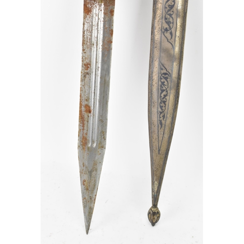 118 - A 19th century Russian Kindjal dagger, the white metal engraved scabbard decorated with a floral scr... 