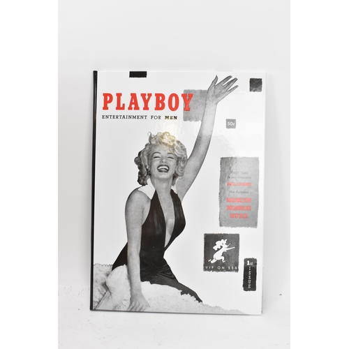 119 - Six volumes of Taschen, Hugh Hefner's Playboy and a reprint of the 1st issue of Playboy, displayed i... 