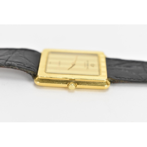 12 - A Raymond Weil, quarts, gents, gold plated wristwatch, having a rectangular dial, the case back numb... 