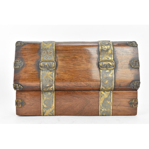 122 - A 19th century French jewellery box, having gilt metal mounts in the form of straps, engraved with f... 