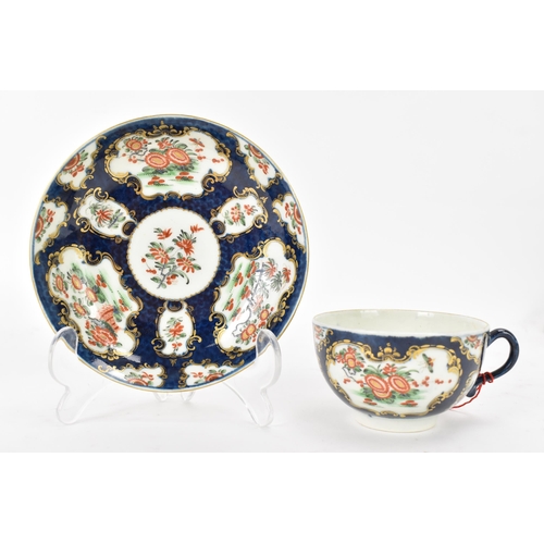 131 - An 18th century Worcester porcelain cup and saucer, circa 1770, painted with chrysanthemums in the R... 