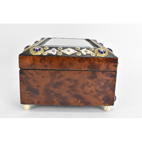 138 - A 19th century French burr yew jewellery casket, having a magnified bevelled glass top, applied with... 