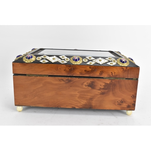 138 - A 19th century French burr yew jewellery casket, having a magnified bevelled glass top, applied with... 