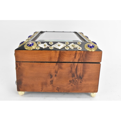 138 - A 19th century French burr yew jewellery casket, having a magnified bevelled glass top, applied with... 