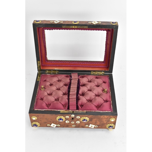 138 - A 19th century French burr yew jewellery casket, having a magnified bevelled glass top, applied with... 