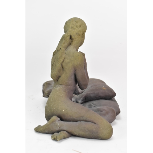 147 - Walter Awlson (Scottish B.1949) A clay nude sculpture depicting a seated nude, signed and dated 1993... 