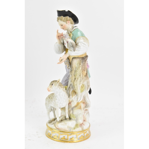 150 - A late 19th century Meissen figure group of a shepherd and lamb, after an original by Acier, the she... 