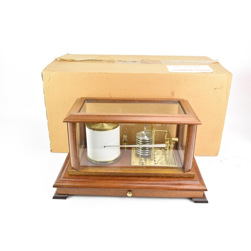 156 - A reproduction mahogany cased barograph by the Gluck Barograph and Recorder Company Ltd, the moulded... 