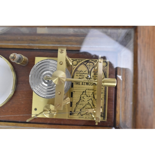 156 - A reproduction mahogany cased barograph by the Gluck Barograph and Recorder Company Ltd, the moulded... 