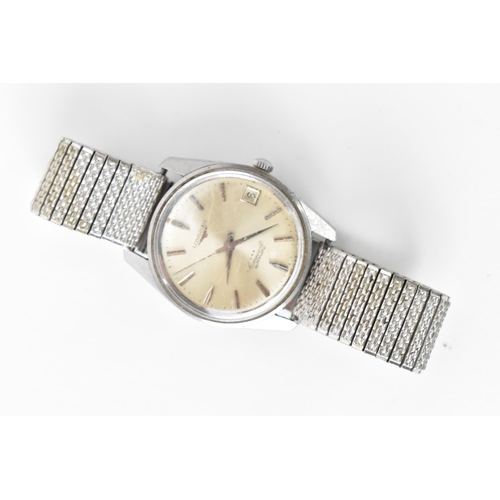 17 - A Longines Conquest, automatic, gents, stainless steel wristwatch, circa 1960s, having a silvered di... 