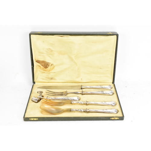 173 - An early 20th century French Christofle cased silver plated carving set, consisting of salad serving... 