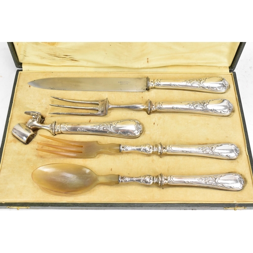 173 - An early 20th century French Christofle cased silver plated carving set, consisting of salad serving... 