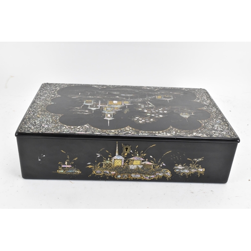 174 - A Victorian lacquered chinoiserie papier-mache writing slope, the black lacquered body hand painted ... 