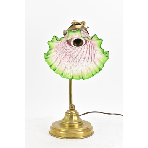 175 - An early 20th century brass table lamp, having a single arm, an adjustable head and an Art Deco gree... 