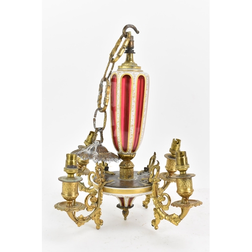 176 - A late 19th century French chandelier, having a bohemian overlaid ruby glass column and finial, with... 