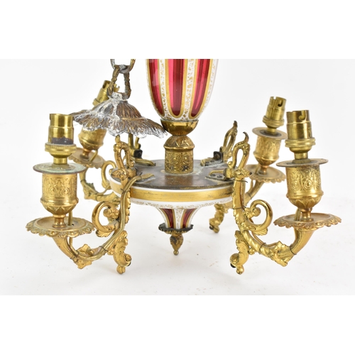 176 - A late 19th century French chandelier, having a bohemian overlaid ruby glass column and finial, with... 