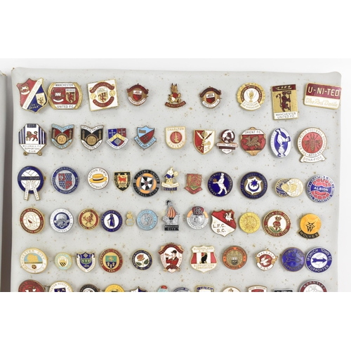 180 - A collection of mainly football enamel pin badges to include Manchester United, Chelsea, Wimbledon, ... 