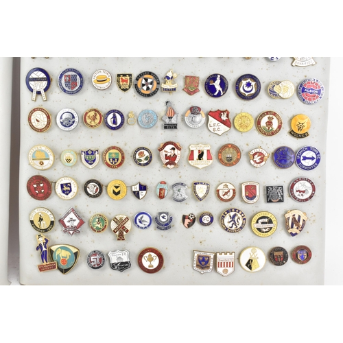 180 - A collection of mainly football enamel pin badges to include Manchester United, Chelsea, Wimbledon, ... 