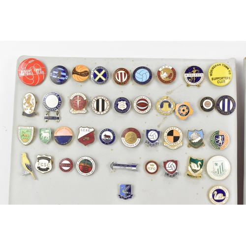 180 - A collection of mainly football enamel pin badges to include Manchester United, Chelsea, Wimbledon, ... 