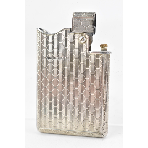 187 - A mid 20th century Asprey & Co Ltd silver lighter, of rectangular form with machine turned decoratio... 