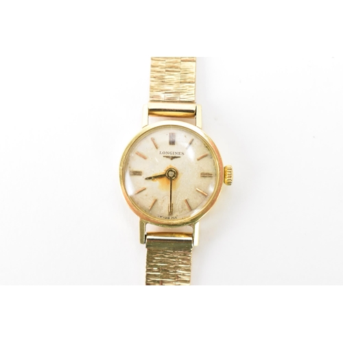 19 - A Longines, manual wind, ladies, 9ct gold wristwatch, the circular silvered dial having gilt baton m... 