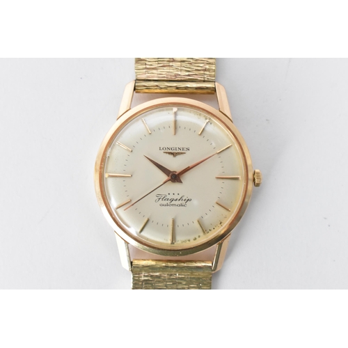 20 - A Longines Flagship, automatic, gents, 18ct gold wristwatch, circa 1961, having a silvered dial with... 