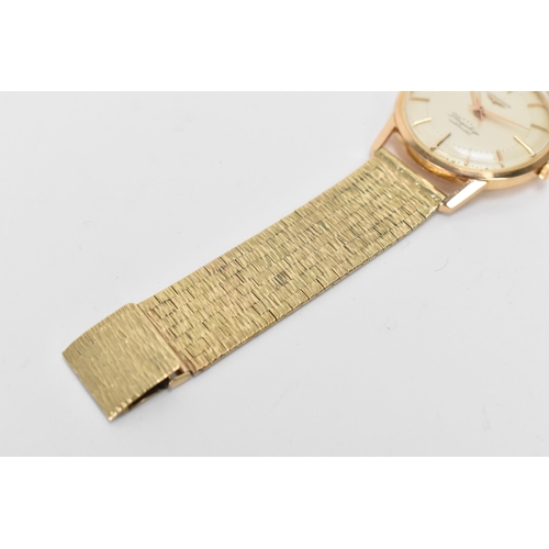 20 - A Longines Flagship, automatic, gents, 18ct gold wristwatch, circa 1961, having a silvered dial with... 