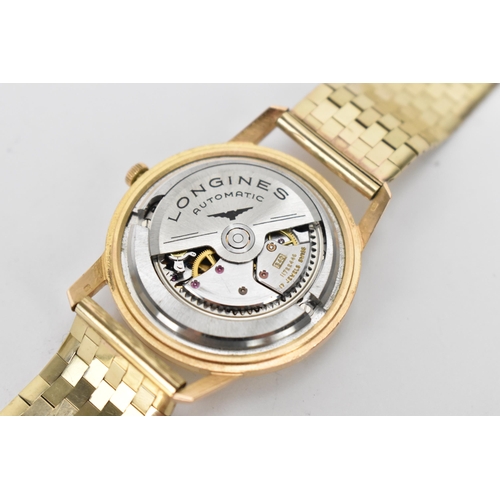 20 - A Longines Flagship, automatic, gents, 18ct gold wristwatch, circa 1961, having a silvered dial with... 