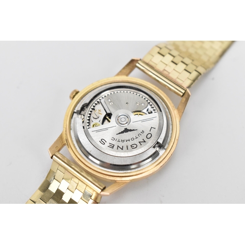 20 - A Longines Flagship, automatic, gents, 18ct gold wristwatch, circa 1961, having a silvered dial with... 