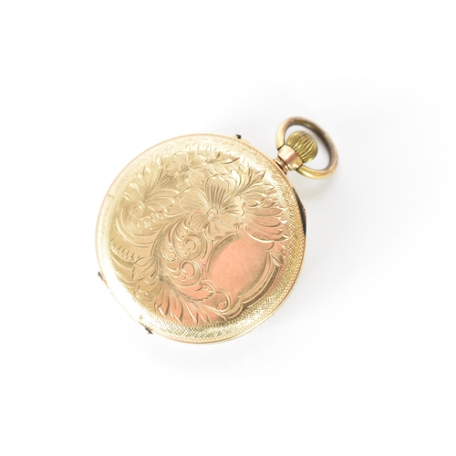 22 - An early 20th century 9ct gold, open face, key-less wound fob watch, the white enamel dial having Ro... 